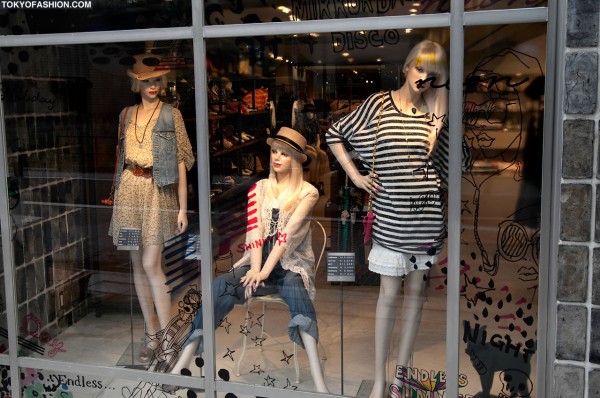 Girls in Hats in Shop Windows