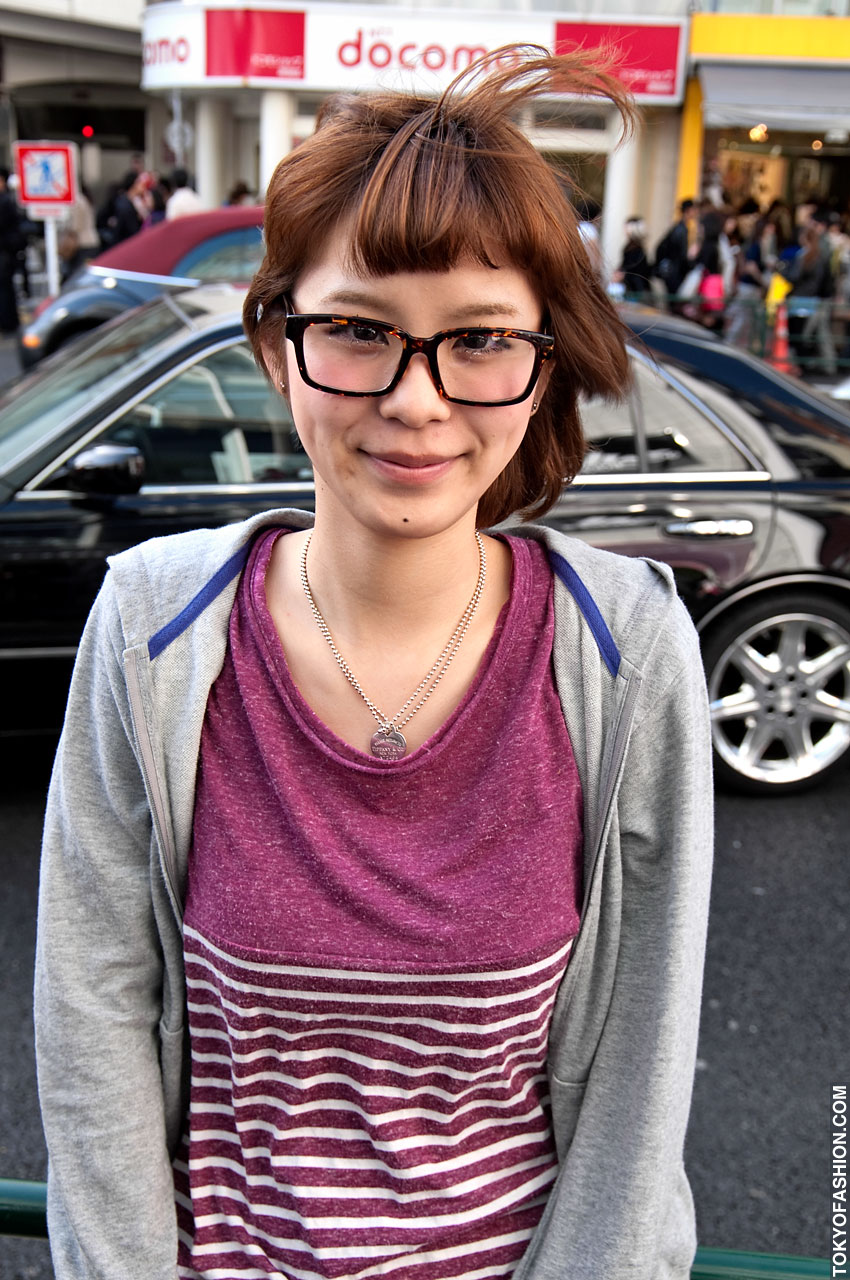 Japanese Glasses Girl And Large Hair Bun In Harajuku