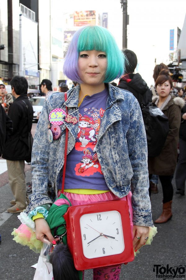 Cute Japanese girl with vintage clock bag