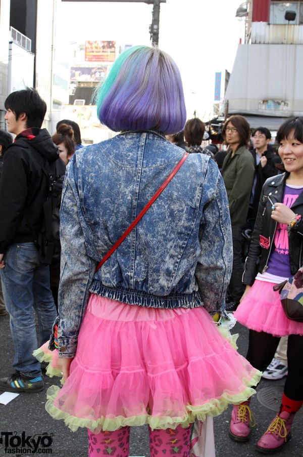 Denim jacket and frilly pink skirt