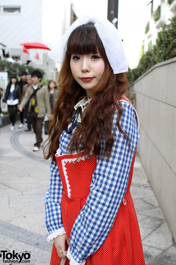 Japanese girl with wavy auburn hair & floppy hair bow