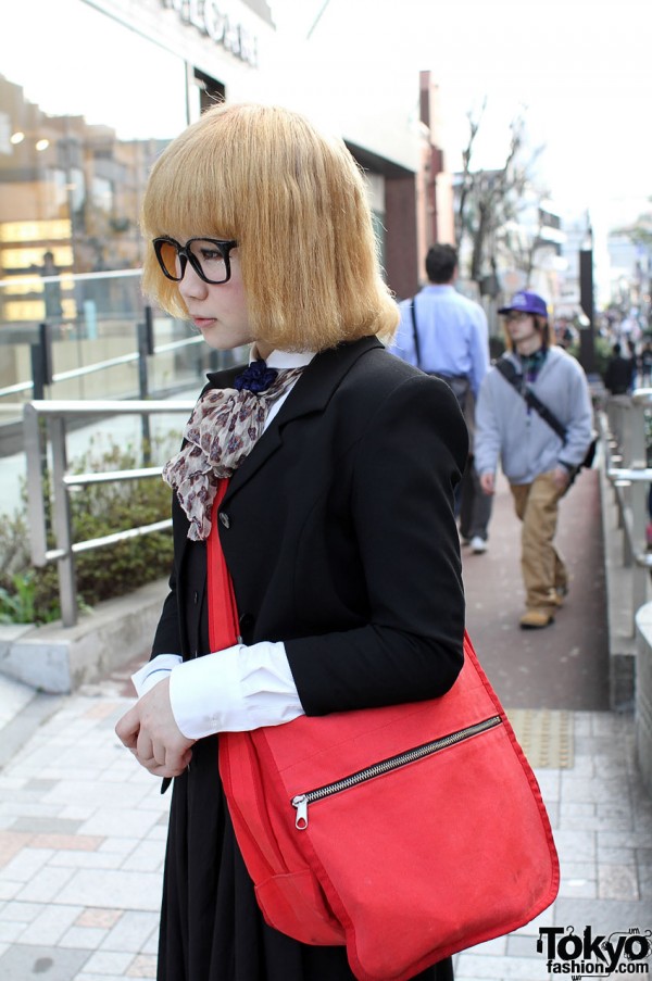 Japanese girl with blonde bob and red Marimekko bag