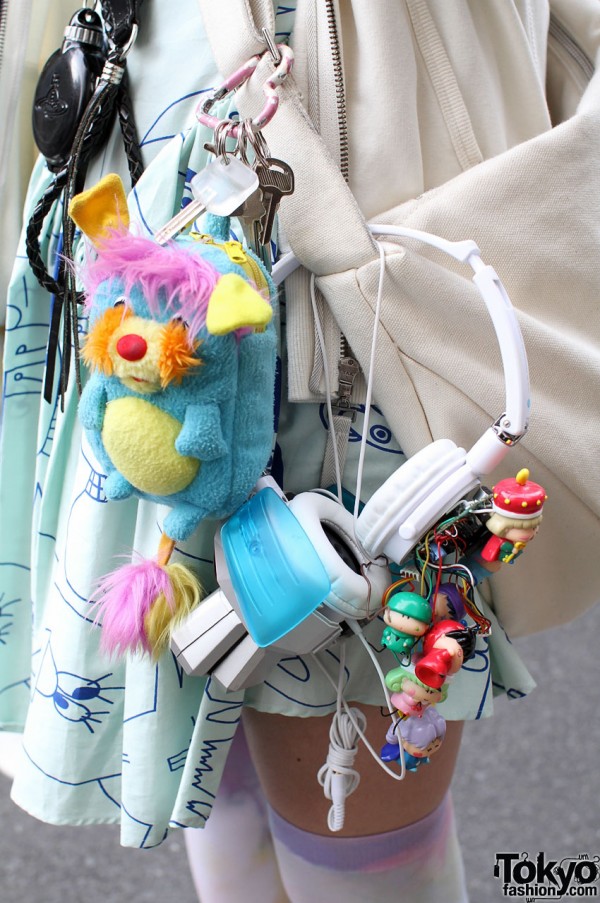 Lad Musician bag with headphones and toys