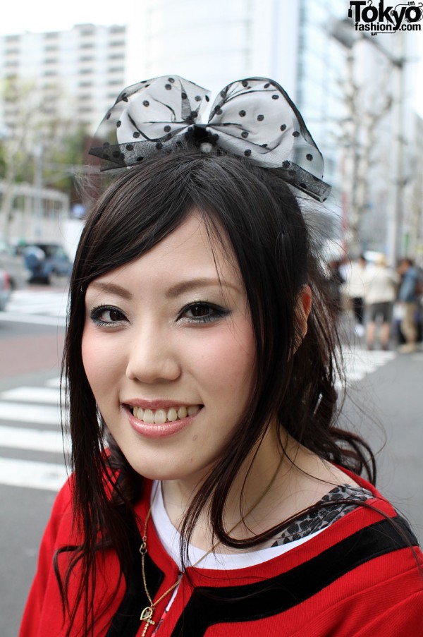 Japanese girl with lage polka dot net hair bow
