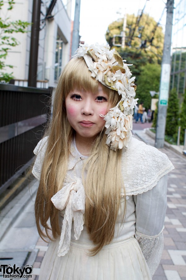 Blonde Japanese girl with antique flowered hat