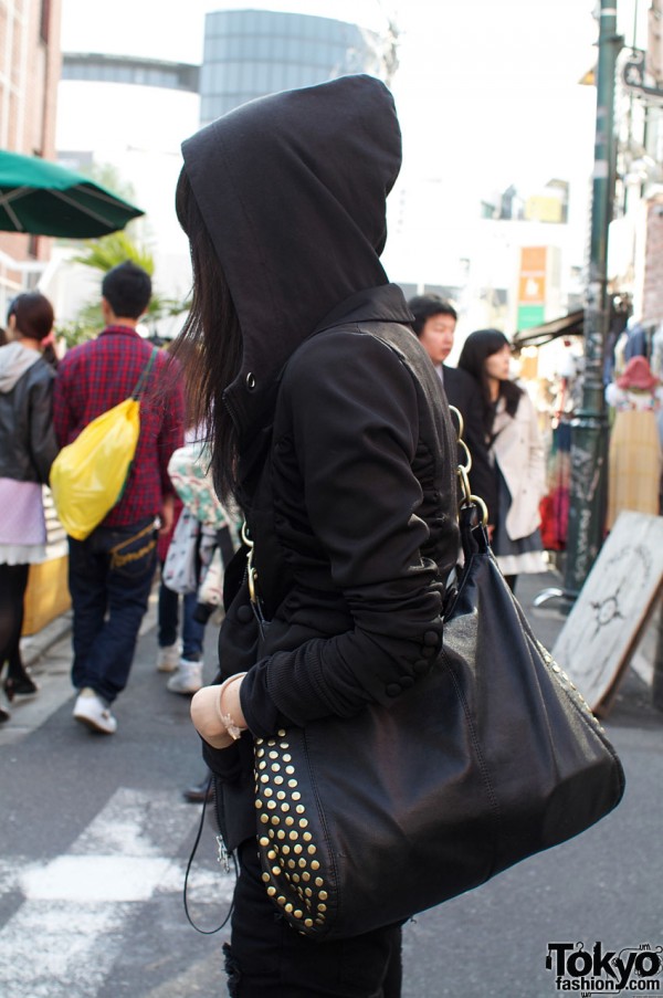 Black leather bag with gold studs