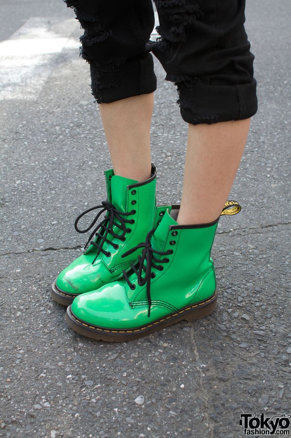 Green Dr. Martens with cuffed skinny jeans