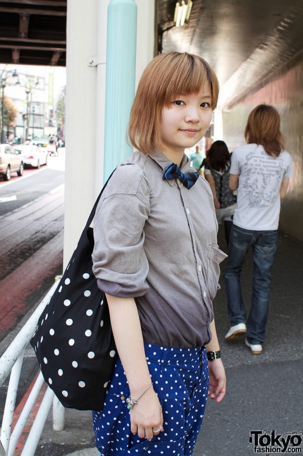 Cute Japanese girl with auburn hair and bow tie