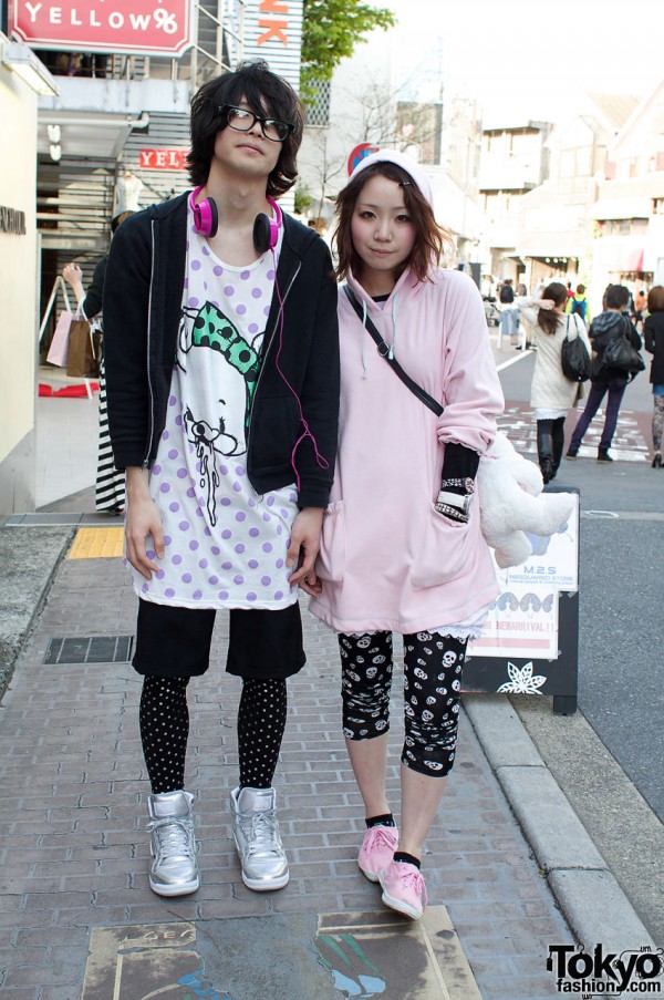 Guy in Monomania graphic t-shirt & girl in Nile Perch hoodie