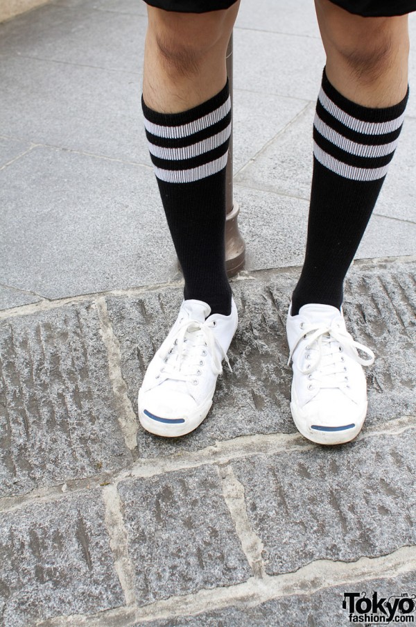 White Jack Purcell sneakers and black socks