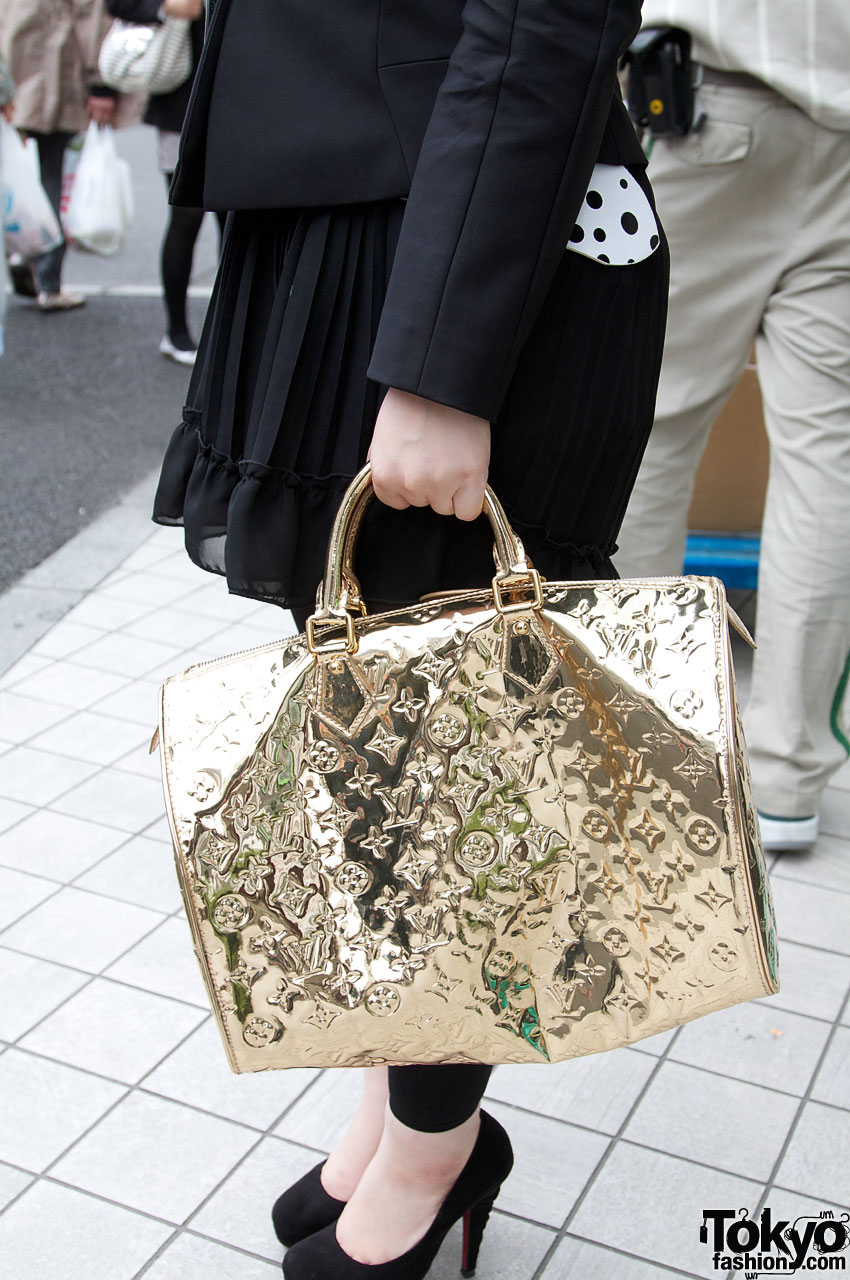 R&E Stilettos and Gold Louis Vuitton Bag