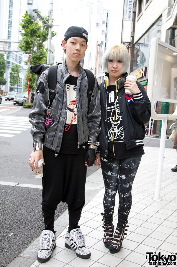 Guy with Jeremy Scott x Adidas and girl with Jeffrey Campbell Wedges
