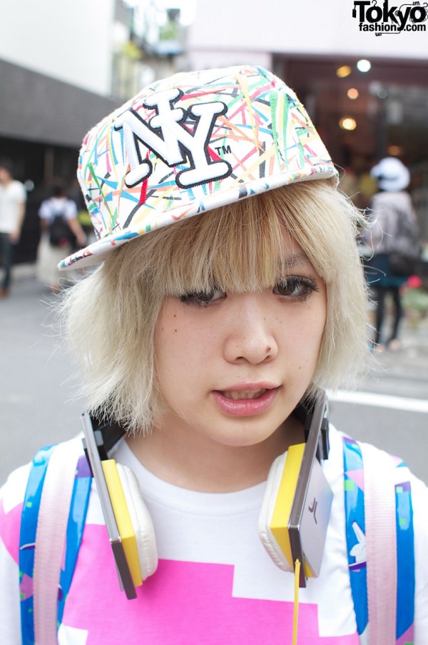 Blonde Japanese girl in NY baseball cap