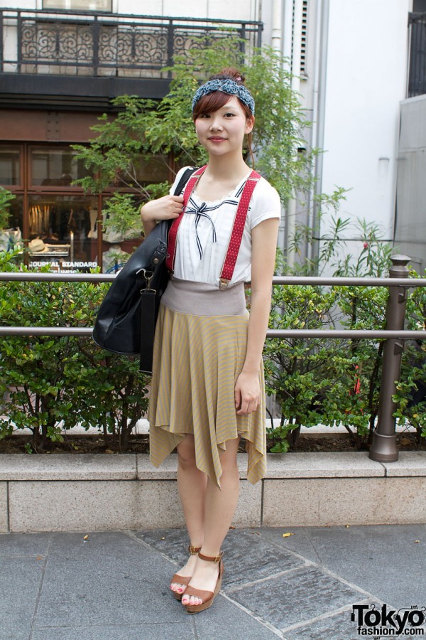 Japanese girl with Nike skirt and red suspenders