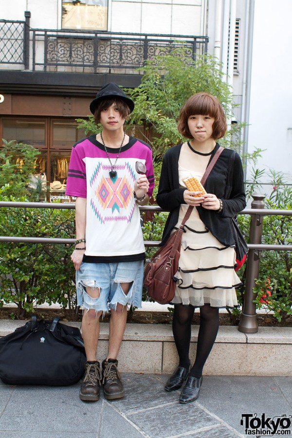 Japanese guy in hat & girl in ruffled Anna Suit dress
