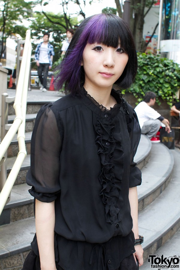 Purple streaked hair & ruffled chiffon top