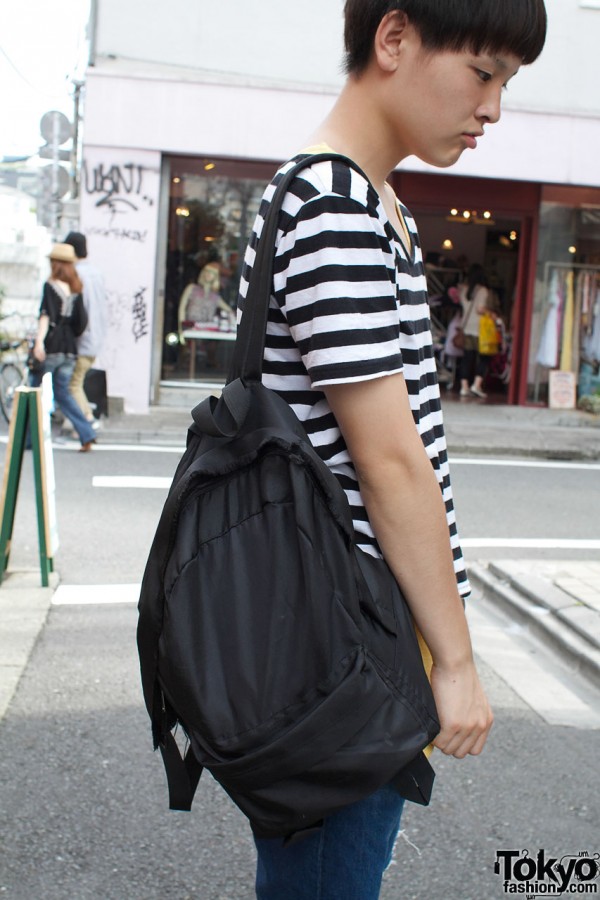 Striped t-shirt & black backpack