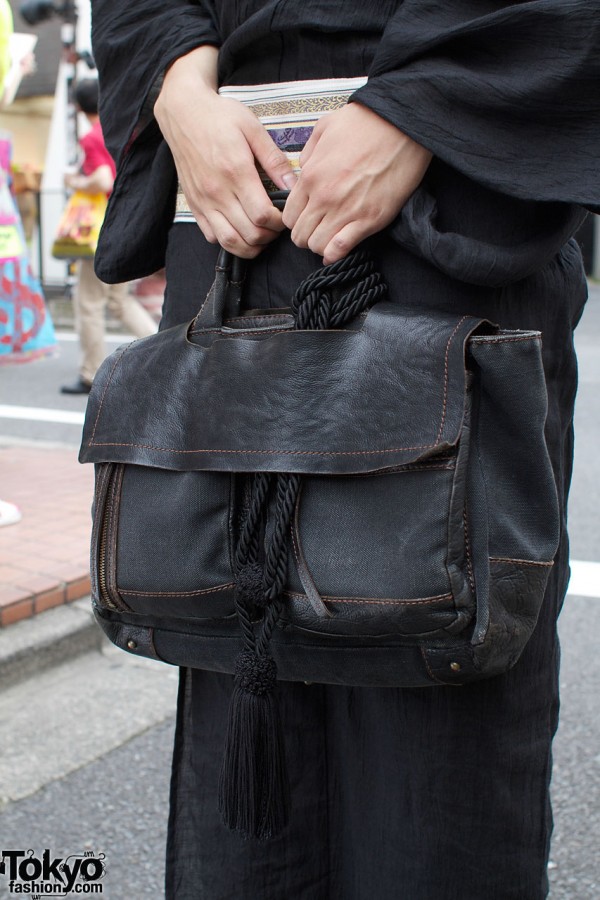 Leather bag with black tassel