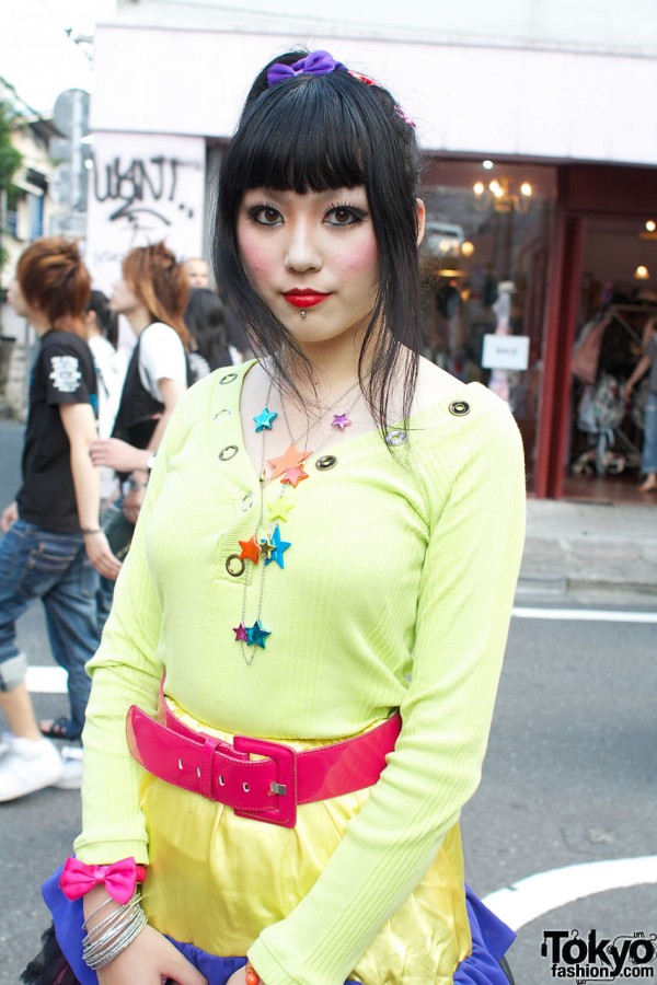 Yellow top & colorful plastic jewelry