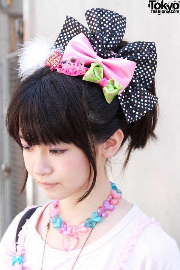 Hair piece with large bows & feather