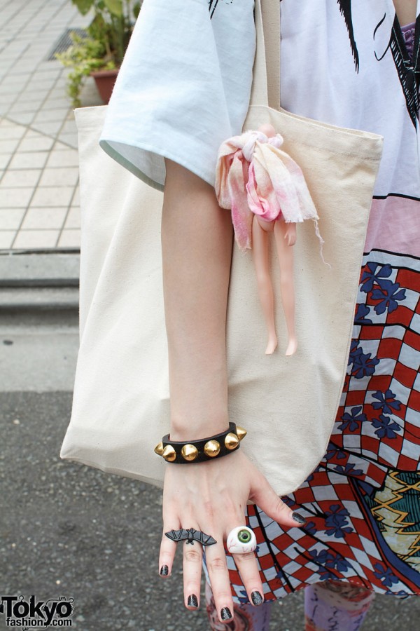 Studded bracelet & bag with doll body