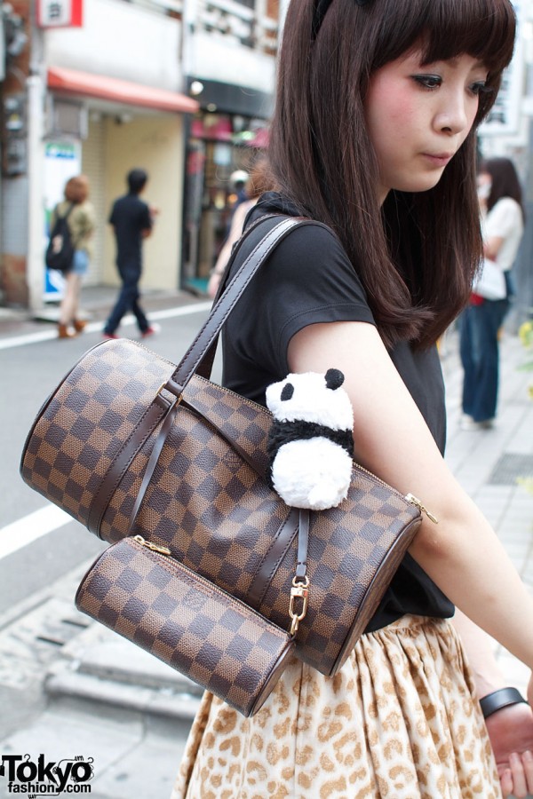 Louis Vuitton bags & stuffed panda