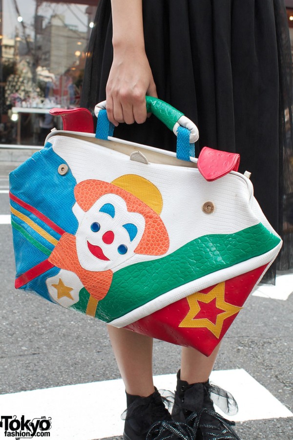 Resale purse with patchwork clown design
