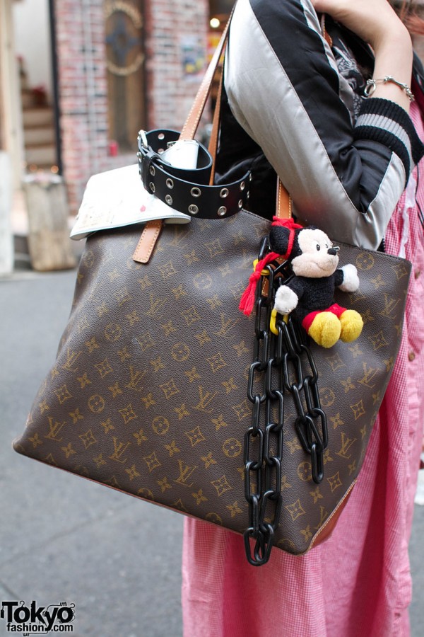 Louis Vuitton bag with Mickey Mouse toy