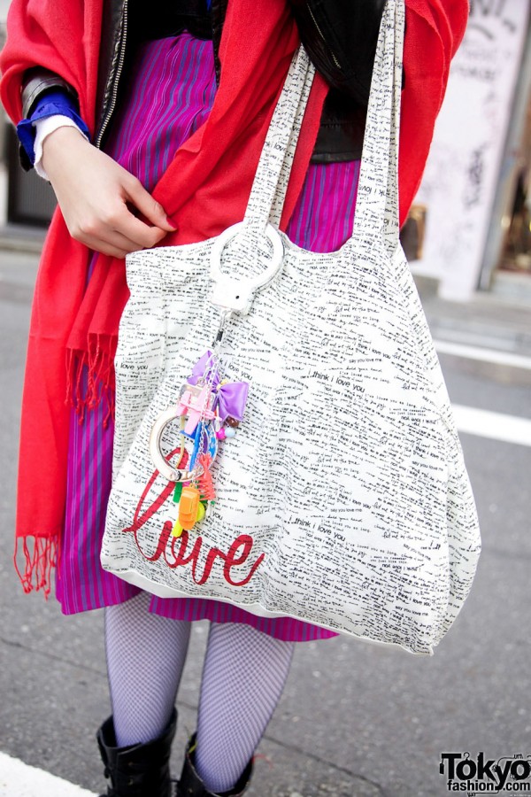 Bag with decorated handcuffs