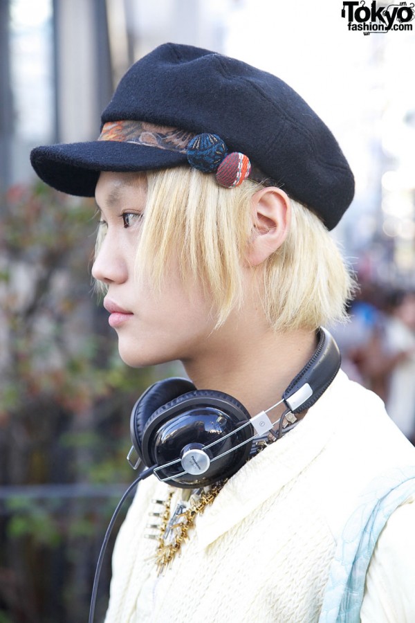 Blonde hair & black cap