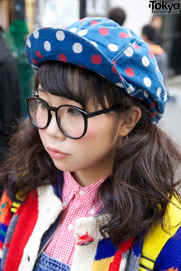 Large glasses, pigtails & polka dot cap