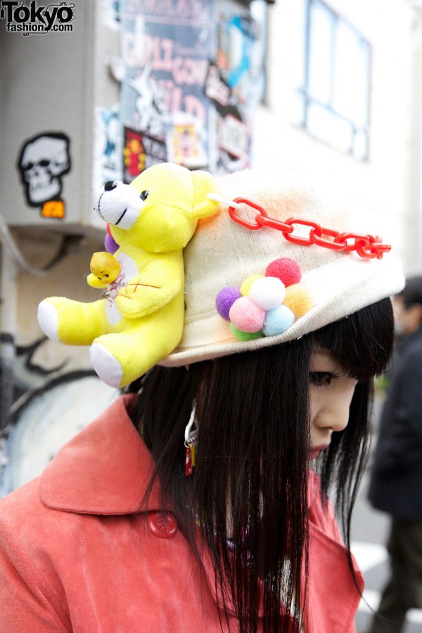 Knit hat with toy bear & pompoms