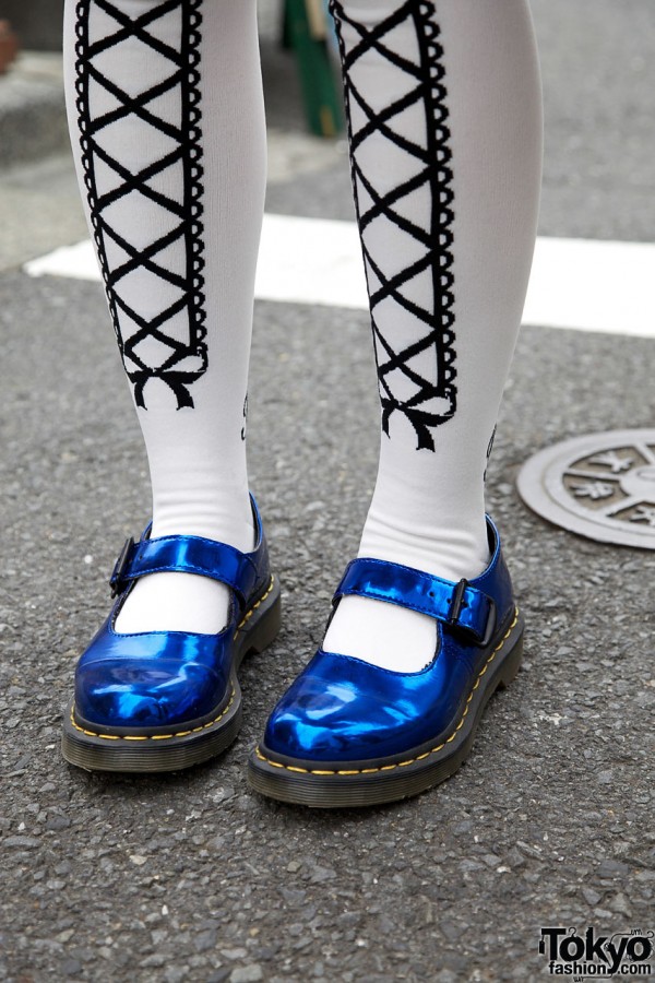 Graphic tights & metallic blue Dr. Martens shoes