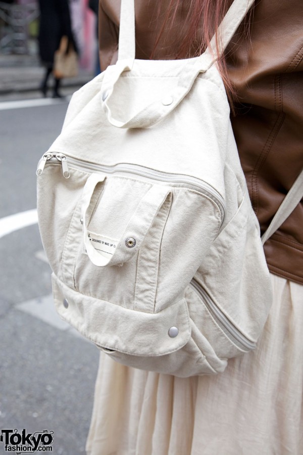 White canvas backpack