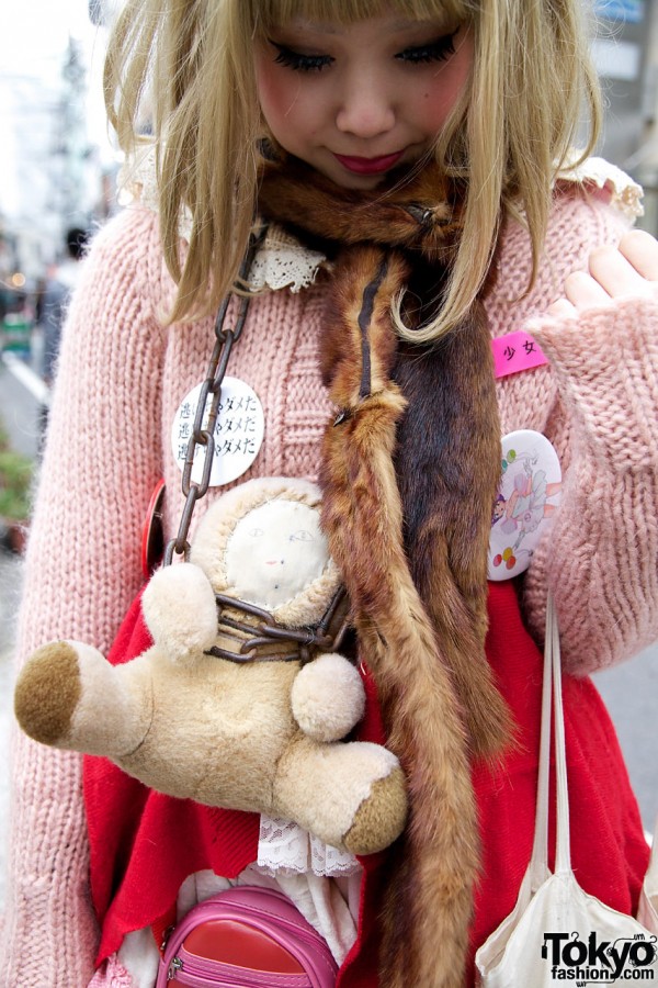 Stuffed animal on chain & fur stole