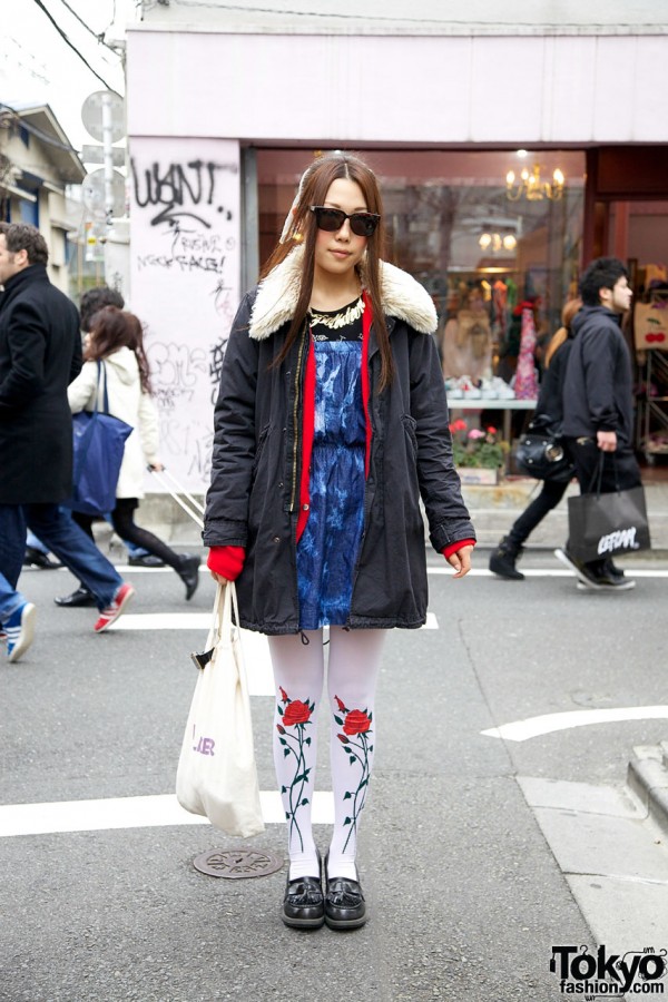 Girl with climbing roses on tights