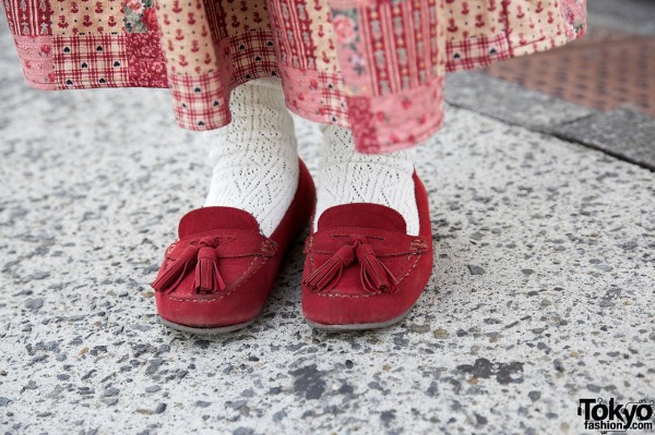 Red suede tasseled loafers
