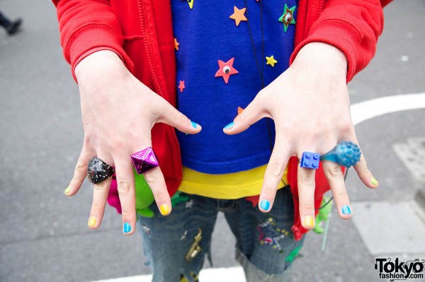 Plastic rings & multicolored nail polish