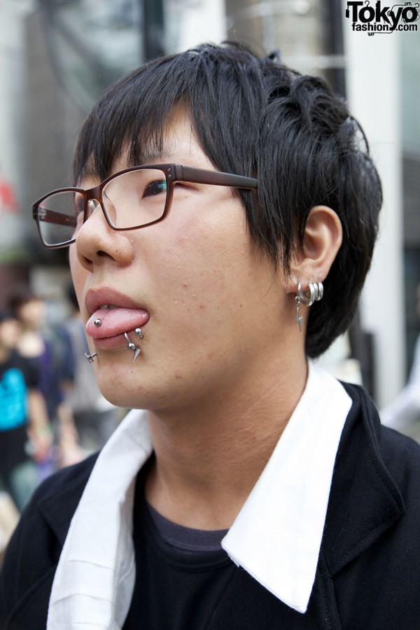 Japanese guy with face piercings