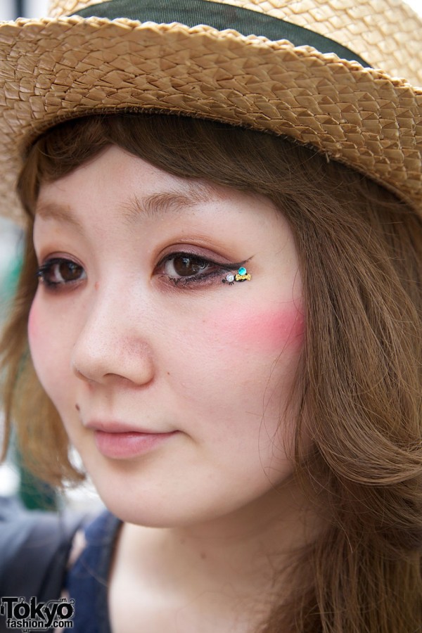 Japanese girl w/ eye makeup with sequins