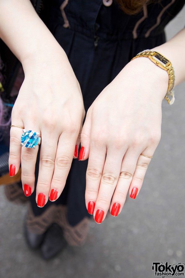 Plastic ring & red nail polish