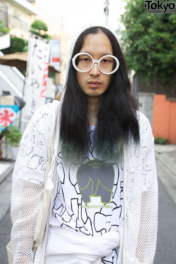 Long-haired guy with large white-framed glasses