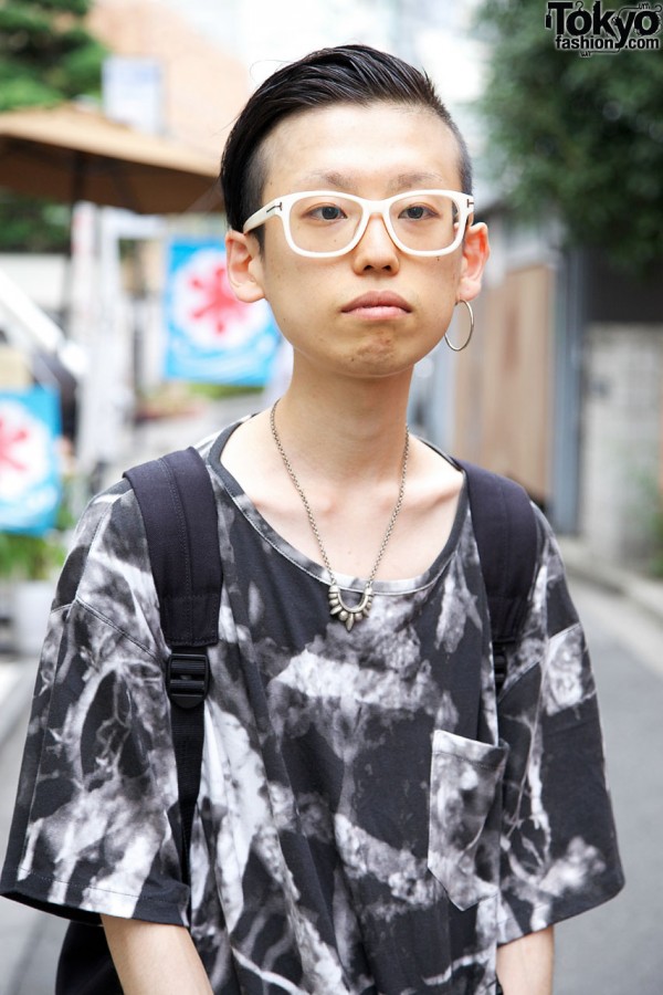 Black-and-white top & white-framed glasses