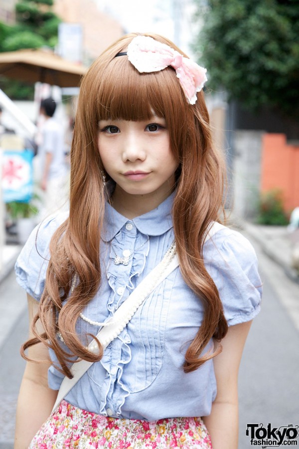 Japanese girl with long auburn hair & pink hair bow