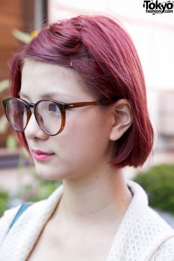 Fuchsia hair & large glasses