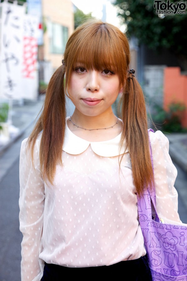 Japanese girl with pigtails in Harajuku