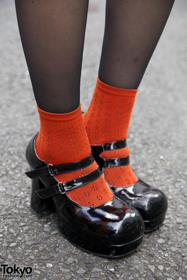 Double strap shoes with orange socks