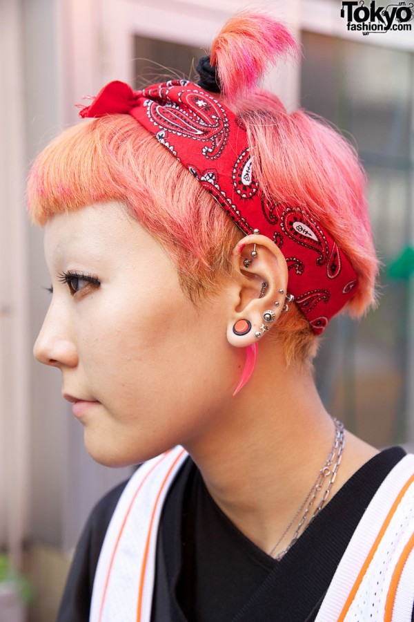 Pink ear plug & silver studs in Harajuku