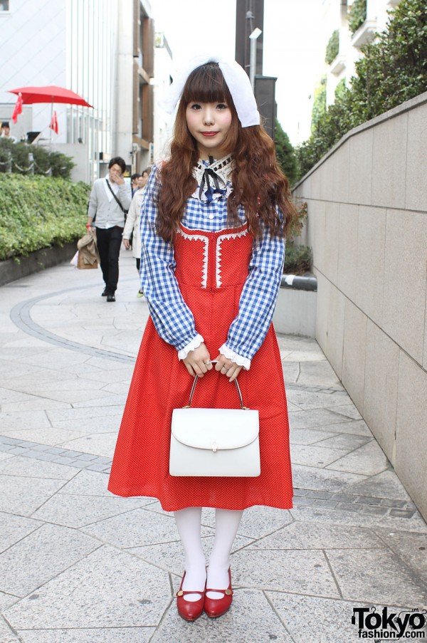 Cute Japanese Dolly-kei girl in a gingham shirt and red dress