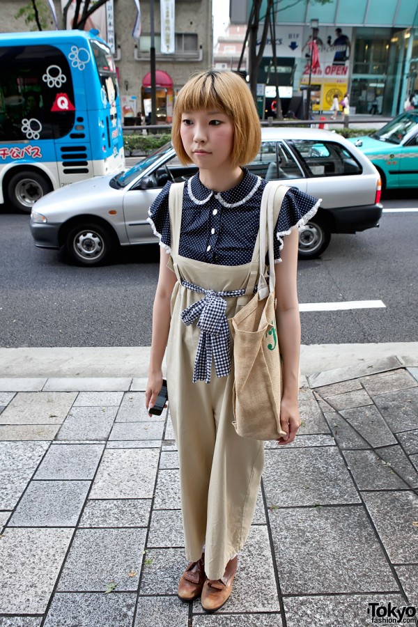 Japanese Girl in Cute Salopette With Theatre Products Bag